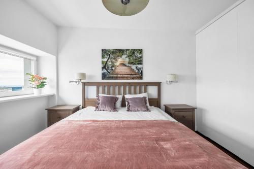 Postel nebo postele na pokoji v ubytování Apartments with view of Warsaw 23rd floor