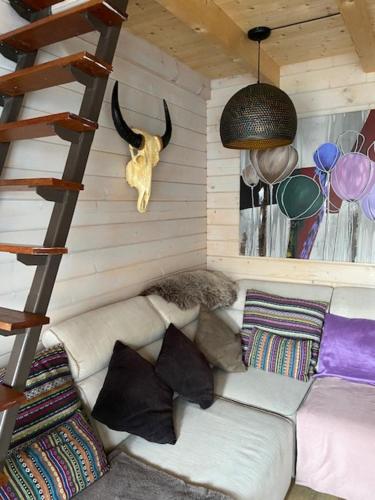 Zona de estar de Tinyhouse Woody at the Water