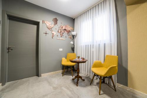 Χώρος καθιστικού στο Aman Apartments