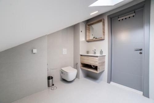 Ένα μπάνιο στο Aman Apartments