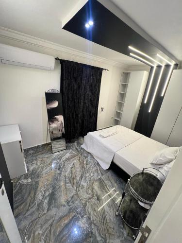 Ένα ή περισσότερα κρεβάτια σε δωμάτιο στο Pyramids View Apartment