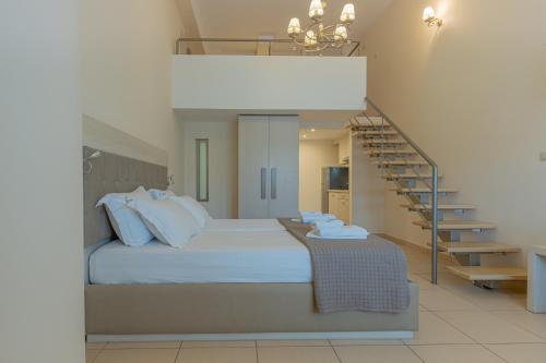 Posteľ alebo postele v izbe v ubytovaní Fani Luxury Apartments Stavros