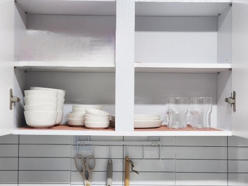 Η κουζίνα ή μικρή κουζίνα στο Monami House Hapjeong, Mangwon