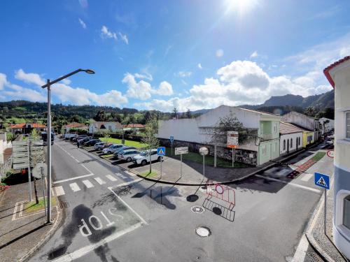 an aerial view of a street in a small town at Hotel Vale Verde in Furnas