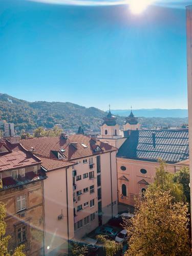 a view of a city with buildings and roofs at Apartments Dani Free Parking in Sarajevo