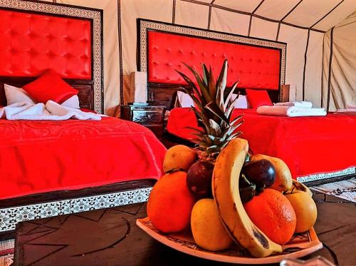 Ένα ή περισσότερα κρεβάτια σε δωμάτιο στο Yalla Luxury Camp Morocco