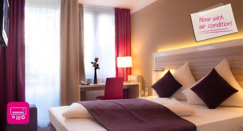 Hotel Mirabell by Maier Privathotelsにあるベッド