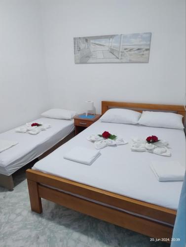 Postel nebo postele na pokoji v ubytování Džodžo Apartments