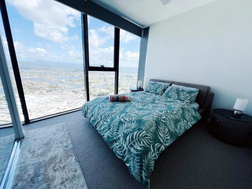 Ένα ή περισσότερα κρεβάτια σε δωμάτιο στο Luxury Casino 1B Apt at Broadbeach