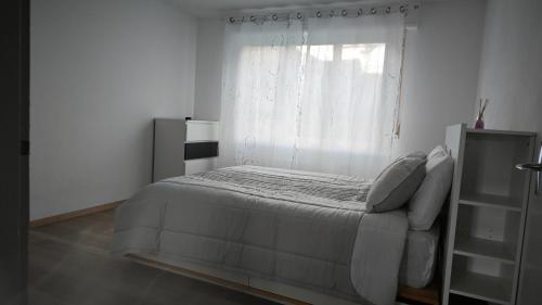 Postel nebo postele na pokoji v ubytování chambre enjoyed