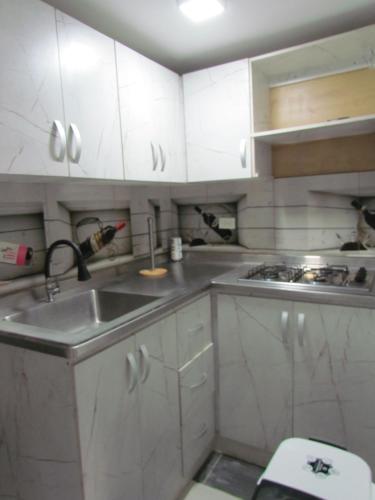 Køkken eller tekøkken på Comodo apartamento Niquia