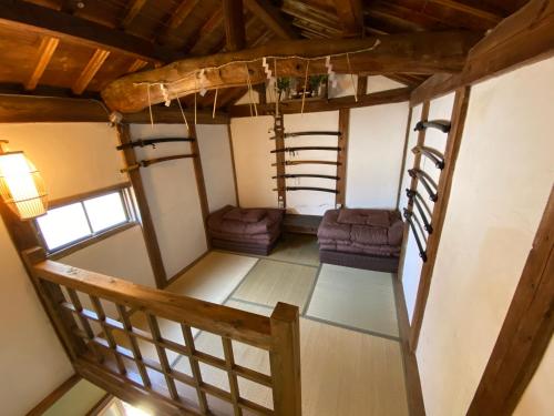 Postel nebo postele na pokoji v ubytování anakashico Hostel Kumano Kodo
