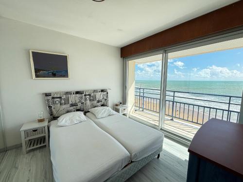 Appartement 2 étoiles face plage avec garage privatif