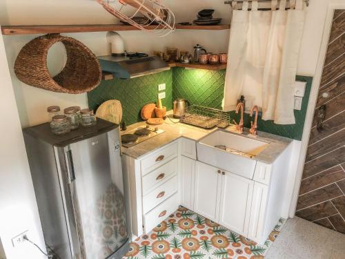 Una cocina o zona de cocina en SANGLEY Nest Eco Home with Self-Service Breakfast - Big Garden, Monkeys, Pet Friendly with a Fee