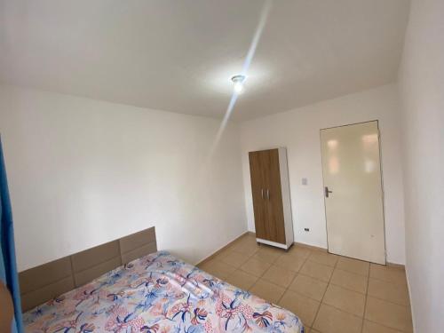 Een bed of bedden in een kamer bij Paraíso Montanha e Mar