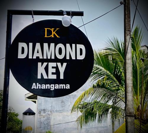 a sign for a diamond keyarmaarmaarmaarmaarmaarmaarmaarmaarmaarma at Diamond Key Ahangama in Piyadigama