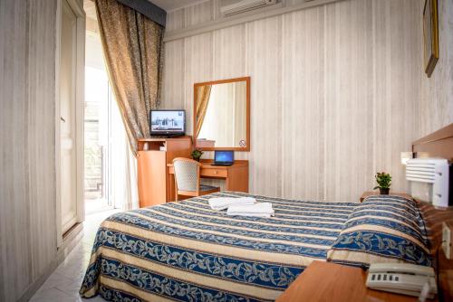 Postel nebo postele na pokoji v ubytování Hotel Emmaus