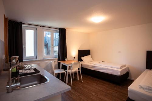 Haus99 Budget Pension & Apartmentsにあるベッド