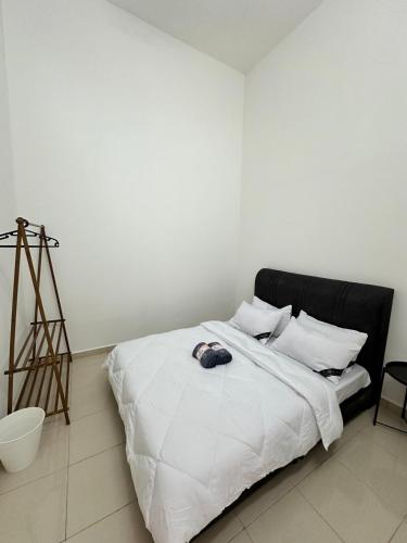 Katil atau katil-katil dalam bilik di Aman Homestay Sendayan
