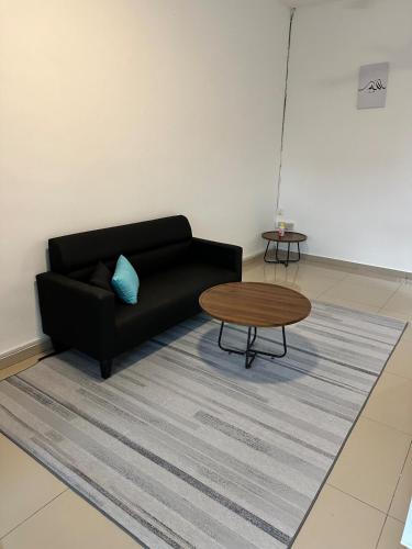 Ruang duduk di Aman Homestay Sendayan