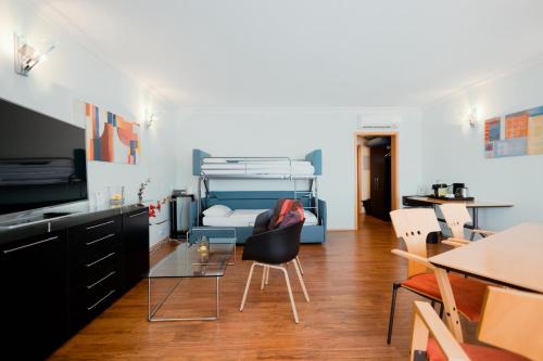 TV a/nebo společenská místnost v ubytování Best Western Hotel Ambassador