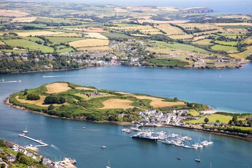 an aerial view of a harbor with boats in the water at Houseboat in Kinsale in Kinsale