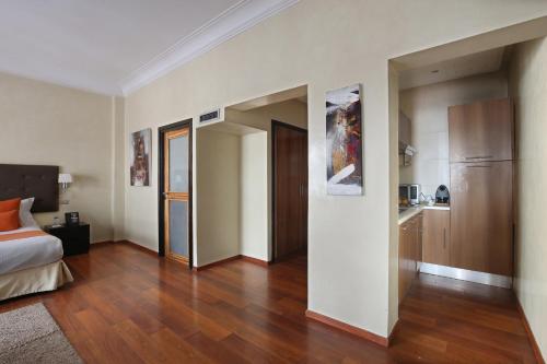 Ein Bett oder Betten in einem Zimmer der Unterkunft Park Suites Hotel Luxury Boutique Hotel