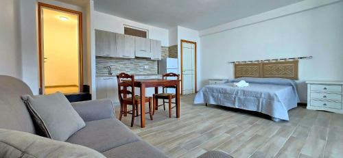 Katil atau katil-katil dalam bilik di Resident Albachiara, Your Oasis in Castelsardo