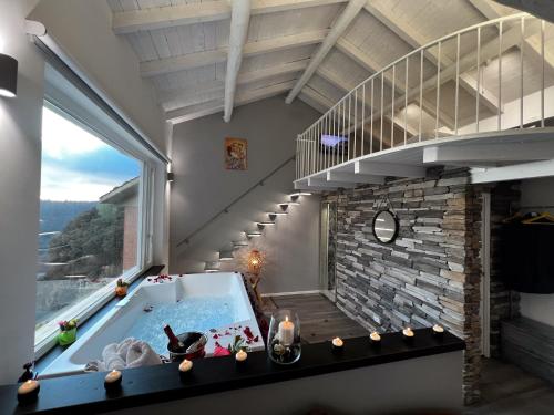 a house with a plunge pool and a staircase at Klimt & Van Gogh Vista Lago by Abitare Il Tempo in Nemi