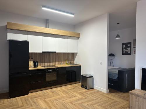Η κουζίνα ή μικρή κουζίνα στο Apartamenty Center