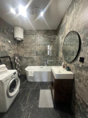 Ένα μπάνιο στο Apartamenty Center