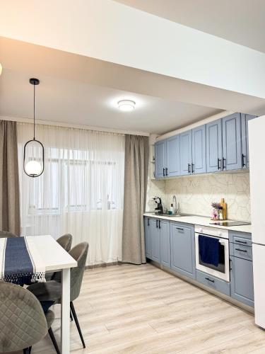 Una cocina o cocineta en Iris Apartment