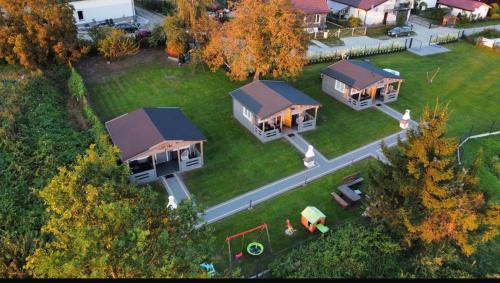 an aerial view of a house in a park at Sosnowy Zakątek Stegna- wędkowanie, rowery, plac zabaw in Stegna