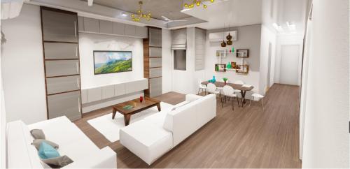 un soggiorno con un divano bianco e un tavolo di Nine House a Città di Malé