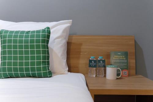 Ein Bett oder Betten in einem Zimmer der Unterkunft Mono Coliving Brotojoyo, Semarang