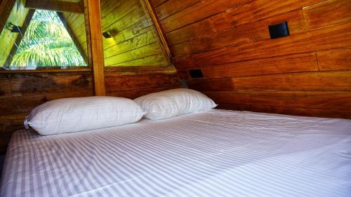 Cama o camas de una habitación en Paddy view cabana sigiriya