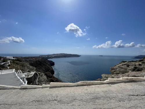 a view of a large body of water on a cliff at Vivian's home in Megalokhori