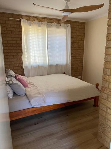 Postel nebo postele na pokoji v ubytování BackersBeach Villa