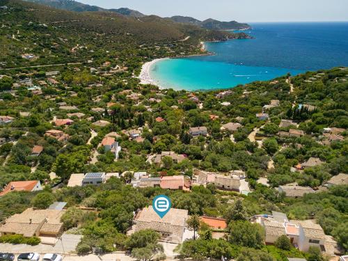 an aerial view of a town with a beach at Estay - Seaside Gem Villa in Torre delle Stelle