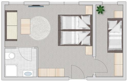 a floor plan of a small apartment with at Eggerhof in Mallnitz