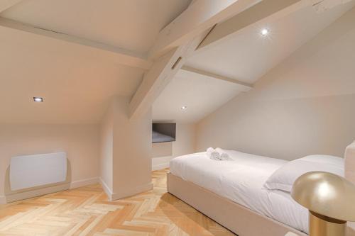 Postel nebo postele na pokoji v ubytování Superbe appartement lumineux proche de Lyon