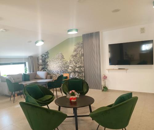 Μια τηλεόραση ή/και κέντρο ψυχαγωγίας στο Drawskie Apartamenty