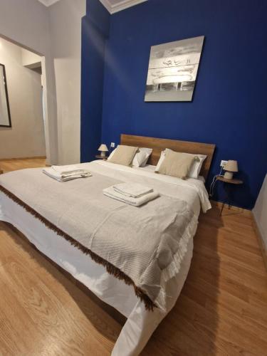 A bed or beds in a room at Closer "Egnatia Apartment 4"