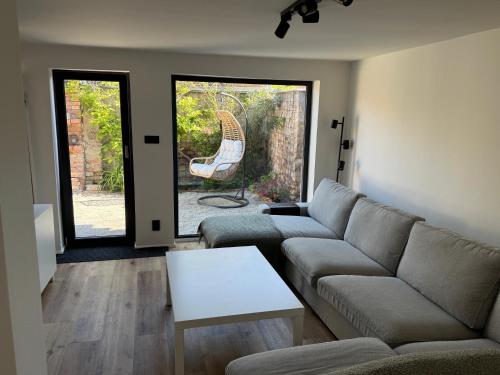 a living room with a couch and a table at U Paňmamky in Šakvice