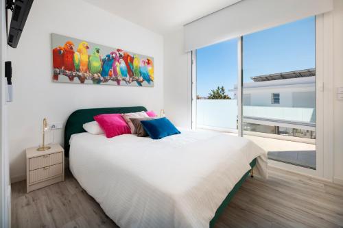 Ένα ή περισσότερα κρεβάτια σε δωμάτιο στο Casa Blanca