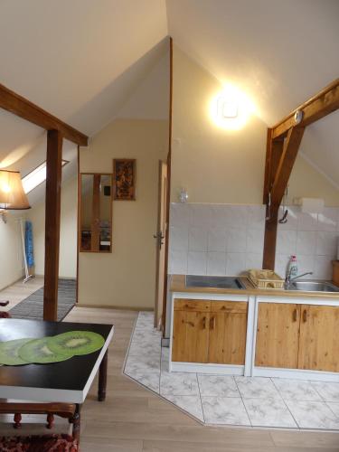 a kitchen with a sink and a counter top at Pensjonat Cichy Kącik in Kąty Rybackie