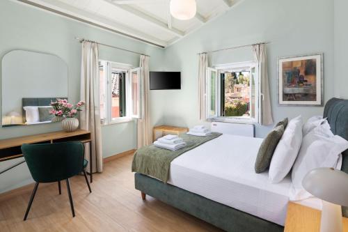 Postel nebo postele na pokoji v ubytování Gangadis Luxury House