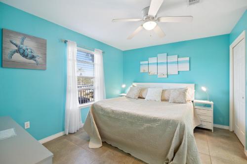 Ένα ή περισσότερα κρεβάτια σε δωμάτιο στο Grand Caribbean East Unit 213