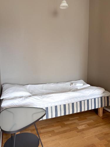 Katil atau katil-katil dalam bilik di Säffle Suites by Svaneholm Hotel