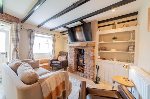 Et tv og/eller underholdning på Pinfold Cottage, Dog Friendly Yorkshire Coast & Countryside